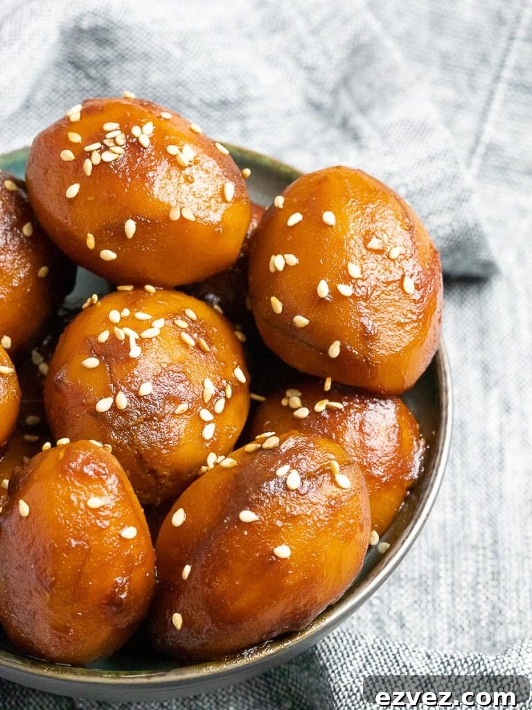 Korean Potato Side Dish, Gamja Jorim in a grey bowl on top of linen