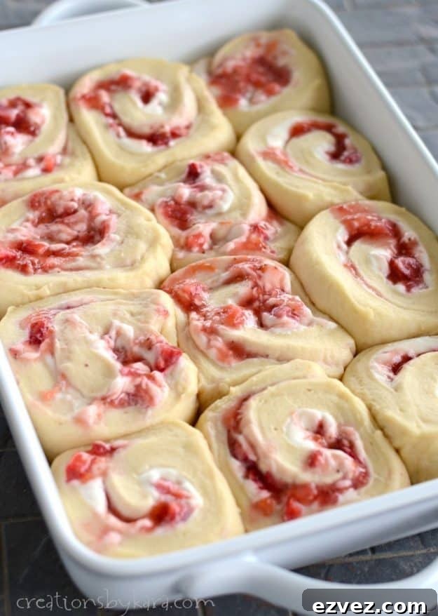 Seriously amazing sweet rolls filled with strawberries and cream cheese.