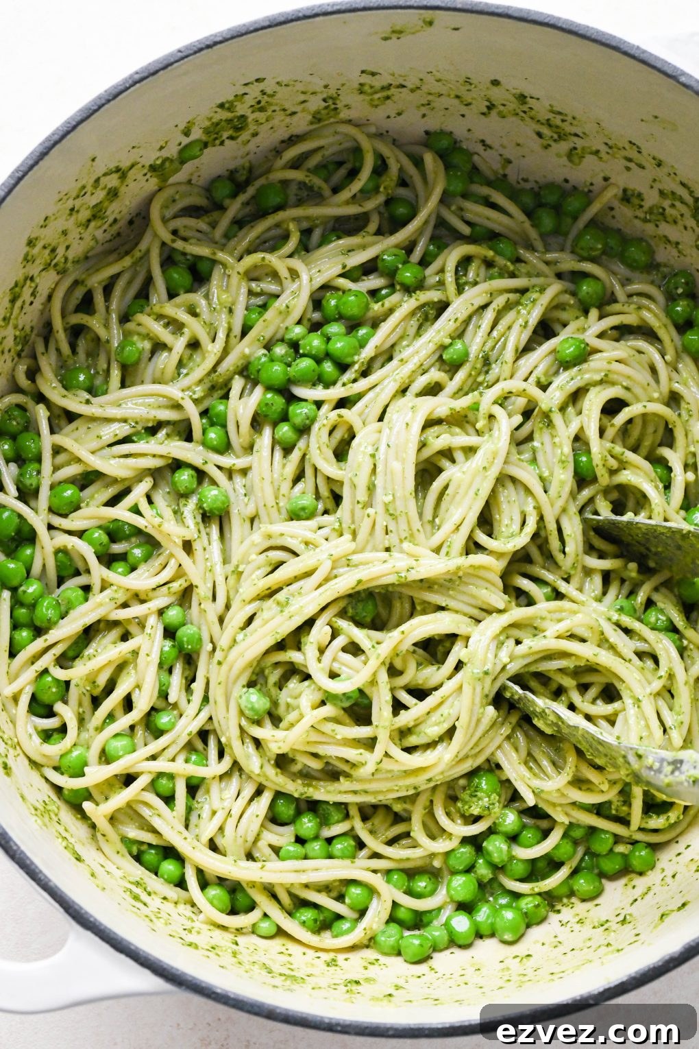 How to make easy pesto pasta: Pasta coated with pesto.