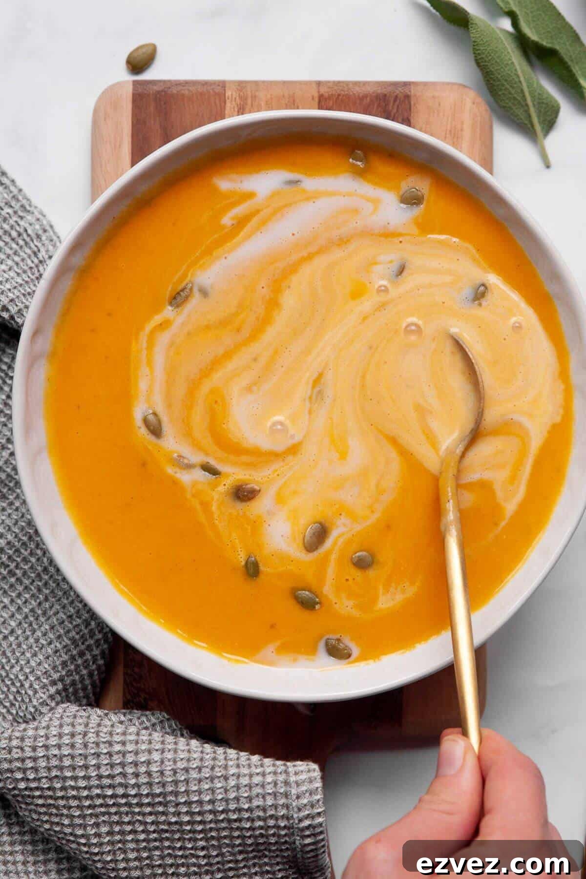 Healthy, vegan sweet potato pumpkin ginger soup.