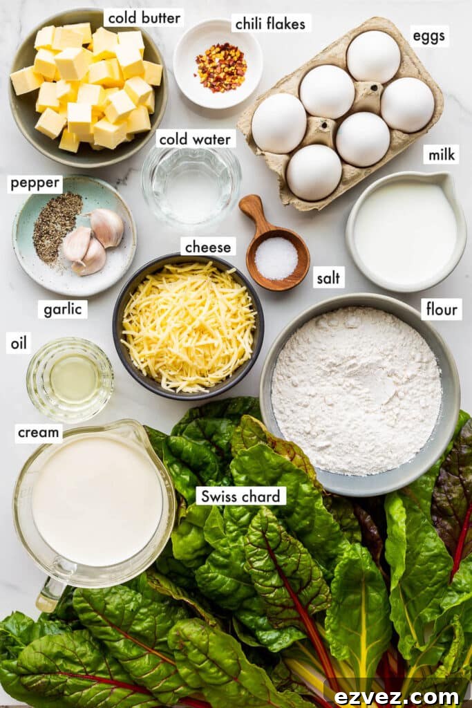 Ingredients to make a deep dish quiche with Rainbow Swiss chard and shredded cheese.
