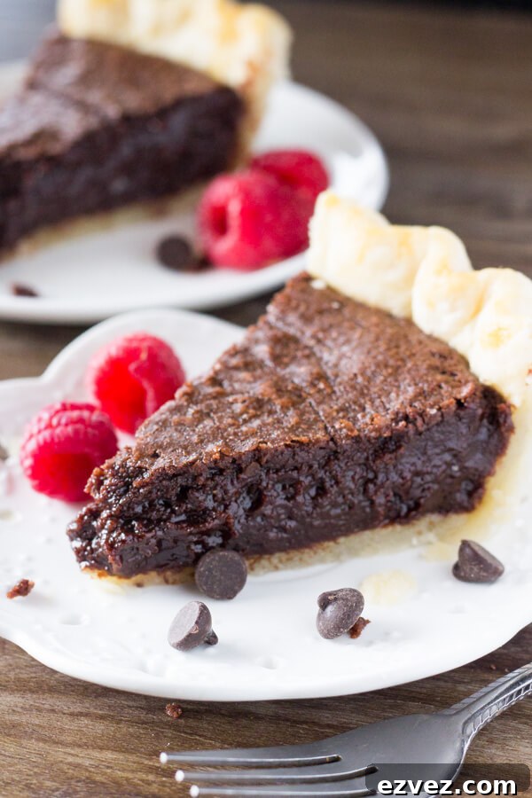 Ultimate Fudge Brownie Pie Recipe with Gooey Chocolate Filling 4 This easy, homemade Fudge Brownie Pie features a flaky, golden pie crust shell filled with the gooiest, fudgiest brownie. Serve it with ice cream & caramel sauce for the ultimate treat!