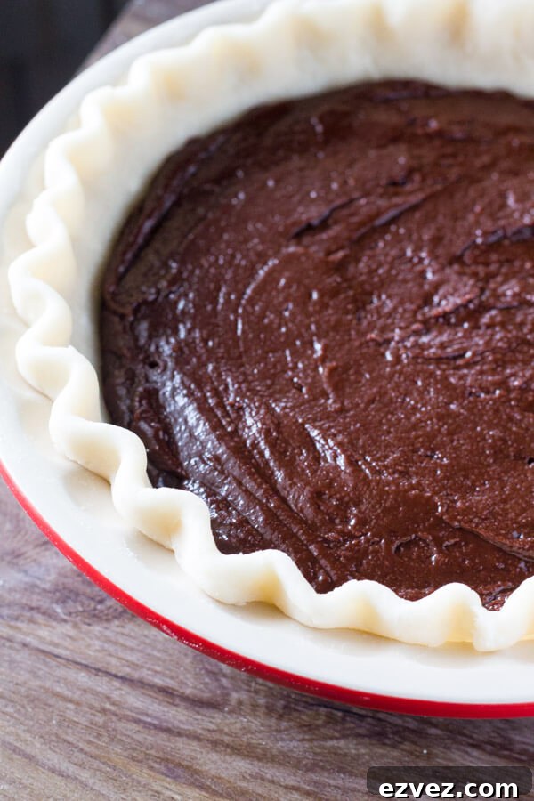 Ultimate Fudge Brownie Pie Recipe with Gooey Chocolate Filling 5 This easy, homemade Fudge Brownie Pie features a flaky, golden pie crust shell filled with the gooiest, fudgiest brownie. Serve it with ice cream & caramel sauce for the ultimate treat!