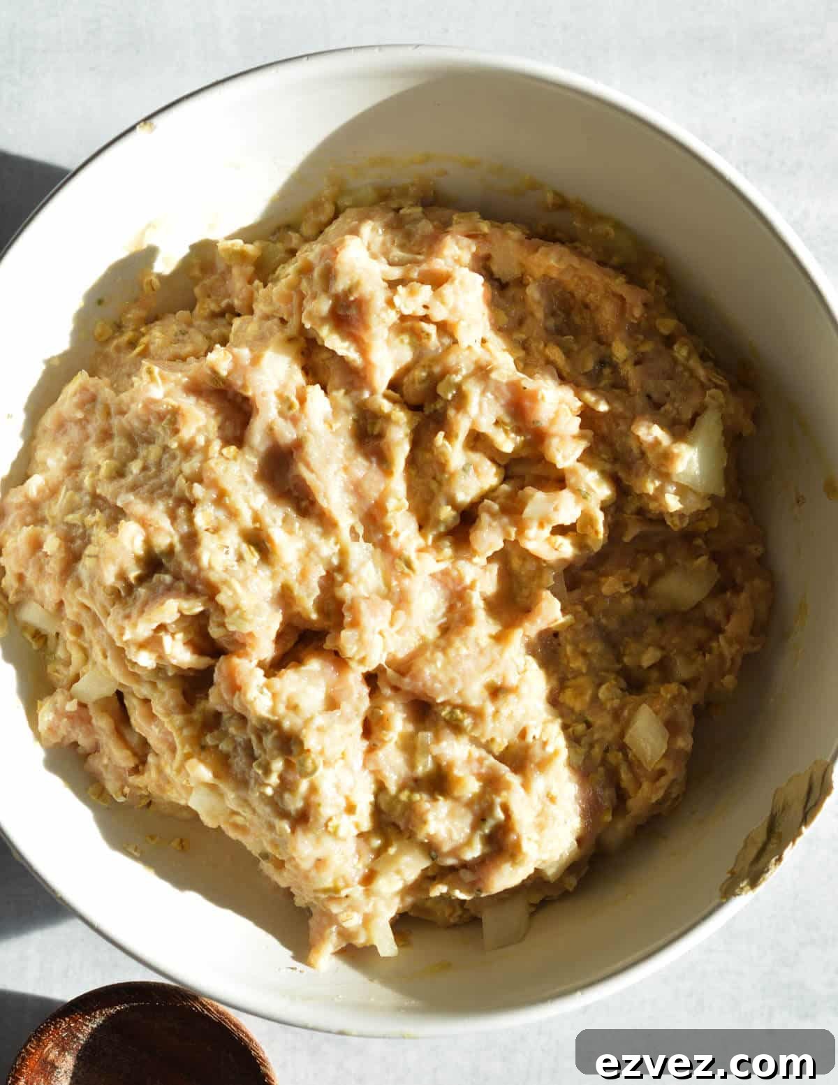 a bowl of ground chicken 