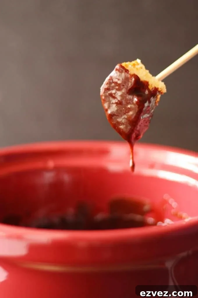 pound cake dipped into chocolate fondue