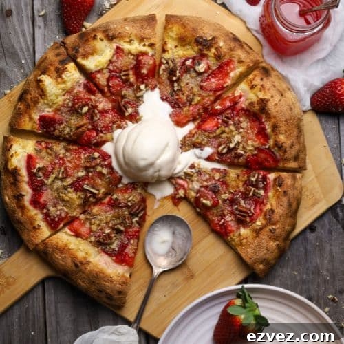 Sourdough Strawberry Crumble Pizza Recipe for Summer Gatherings 6 A sourdough strawberry crumble pizza topped with vanilla ice cream.