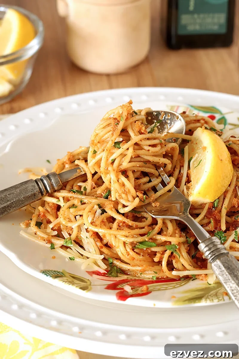 Fork Twirled with Pasta with Sun-Dried Tomato and Roasted Almond Pesto