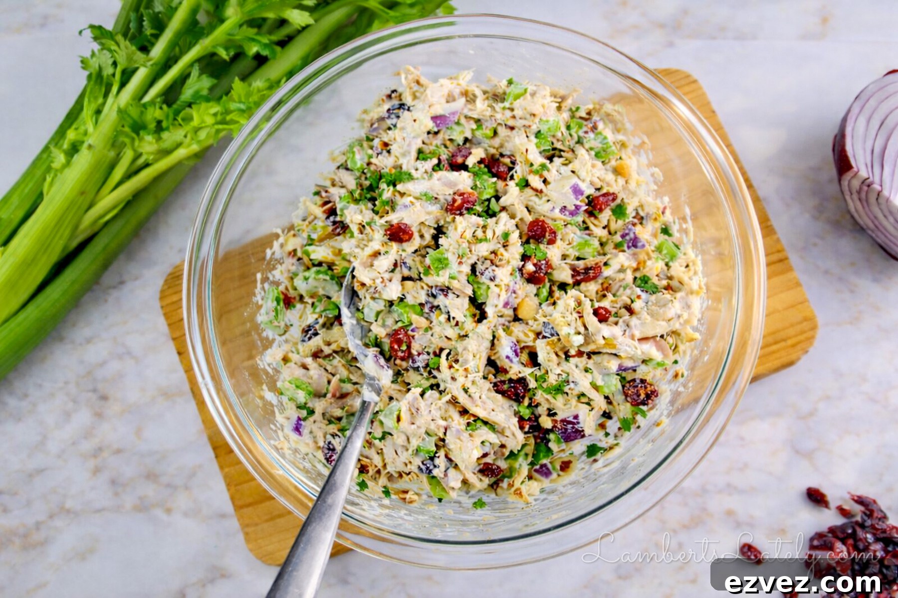 mixed cranberry chicken salad in a bowl.
