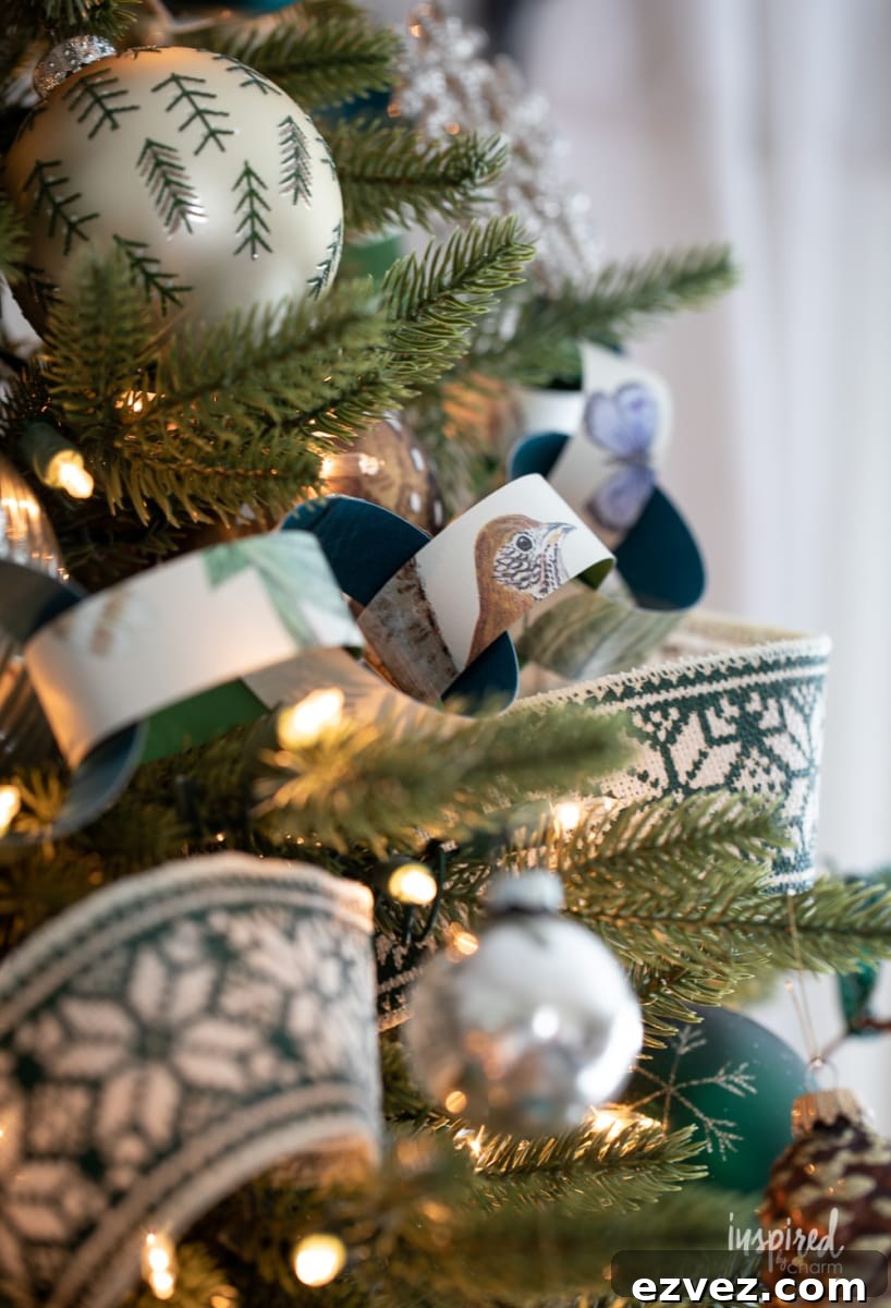 DIY Christmas Paper Chains from Wallpaper Rolls: Festive Holiday Decor 13 paper chain garland on Christmas tree.