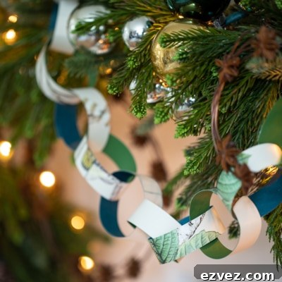 DIY Christmas Paper Chains from Wallpaper Rolls: Festive Holiday Decor 14 close up of paper chain garland.