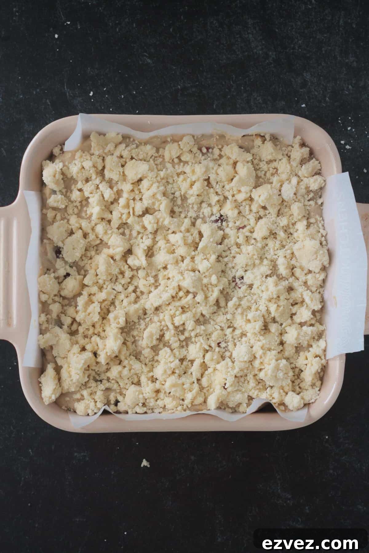 Crumbly streusel covering the top of the orange cranberry cake.