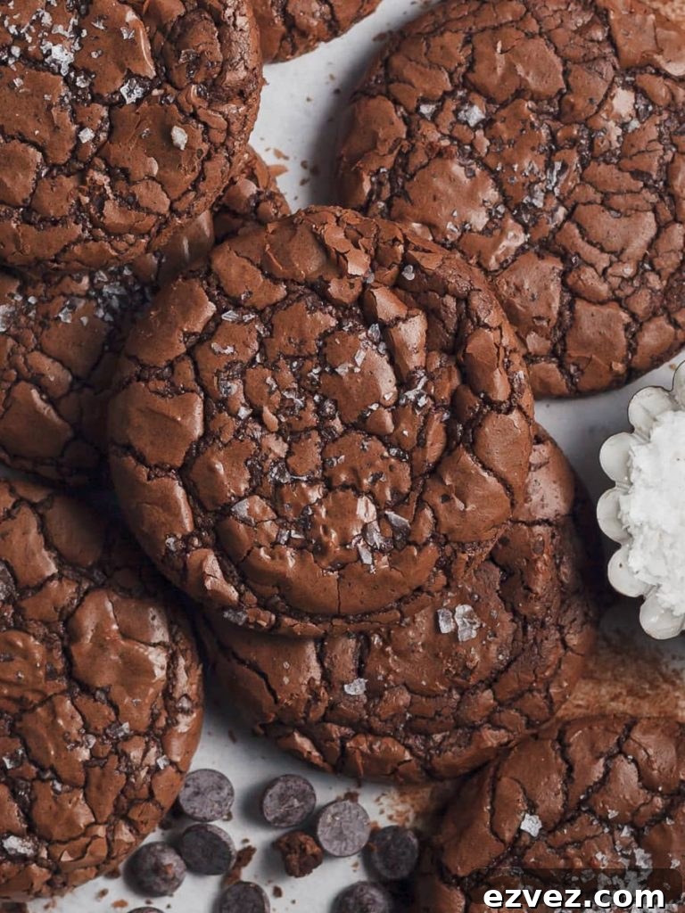 Do you love brownies? Do you love cookies? Then my Gluten Free Fudge Brownie Cookies are exactly what you are looking for. A delectable gluten free chocolate cookie with a crinkle outside with a fudgy center. This recipe is every chocolate lovers ultimate dream come true.
