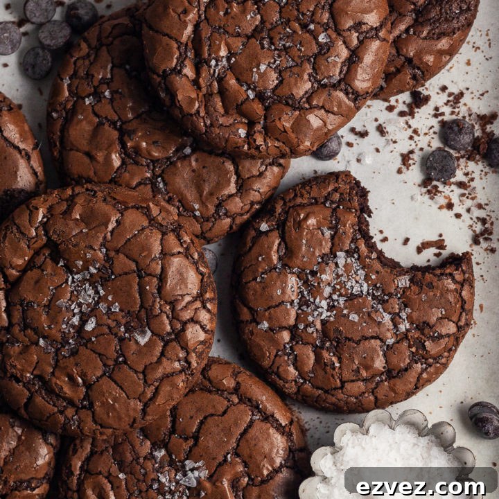 Do you love brownies? Do you love cookies? Then my Gluten Free Fudge Brownie Cookies are exactly what you are looking for. A delectable gluten free chocolate cookie with a crinkle outside with a fudgy center. This recipe is every chocolate lovers ultimate dream come true.