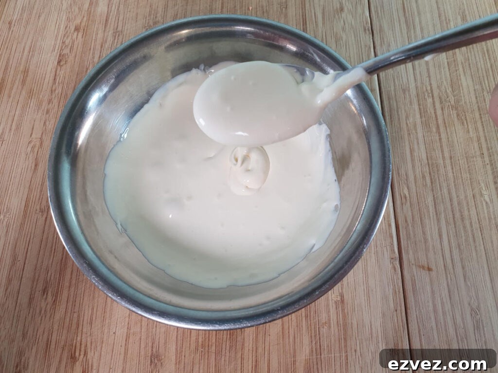 stirring sour cream to loosen up.