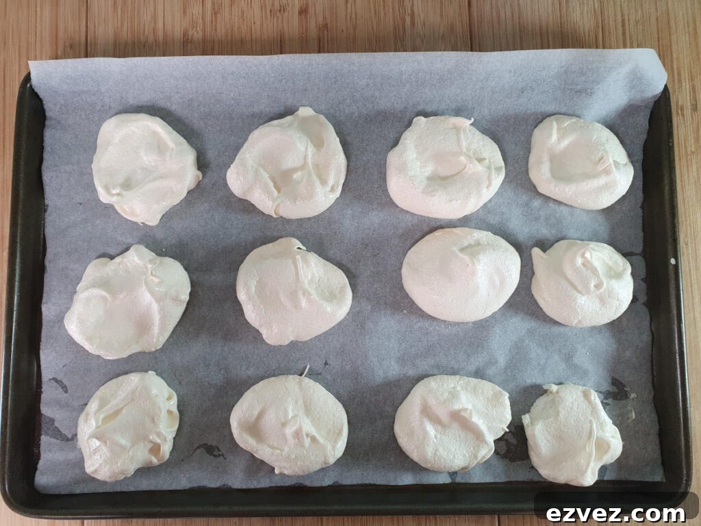 baked meringues on tray.