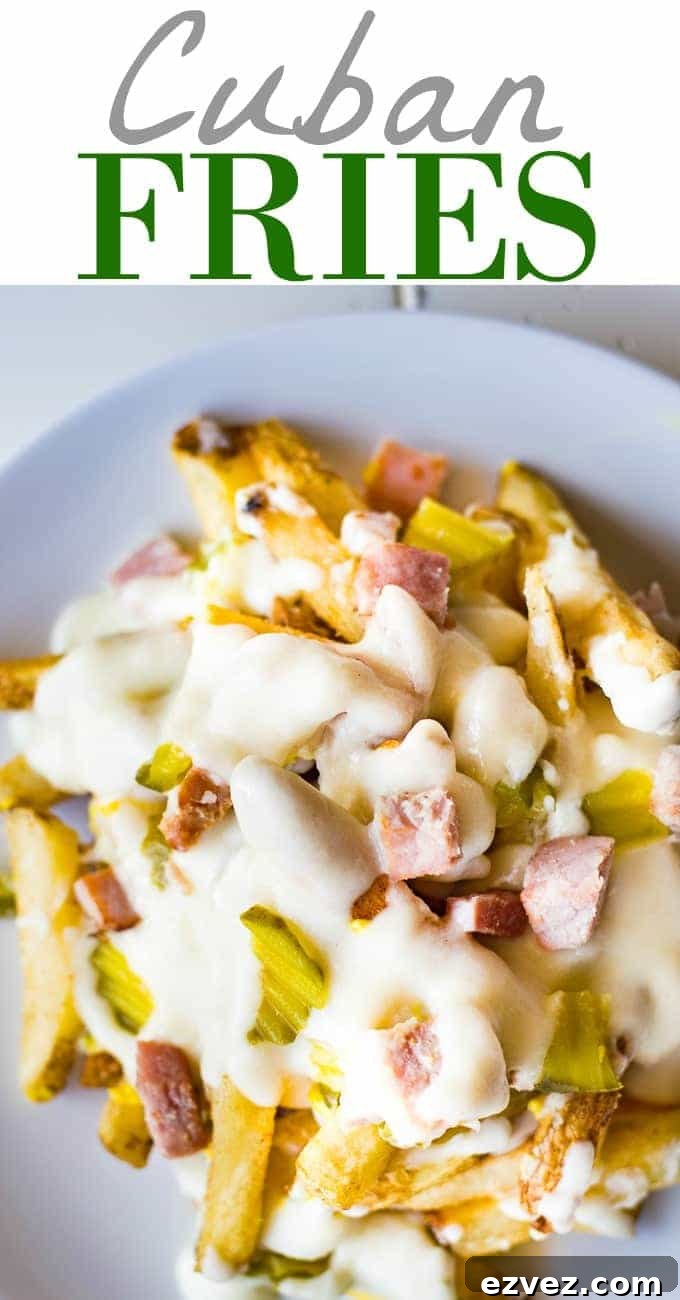 Crispy french fries loaded with all the flavors of a Cuban sandwich and topped with a creamy swiss cheese sauce! The ULTIMATE appetizer or snack recipe! A definite crowd pleaser!