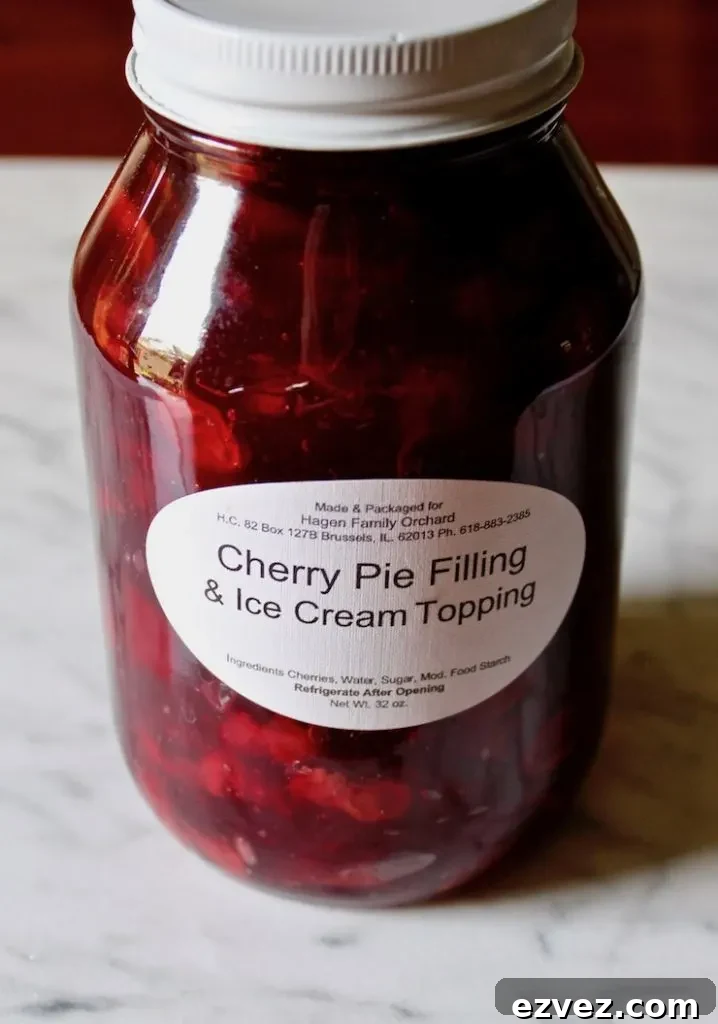 Jar of cherry pie filling.