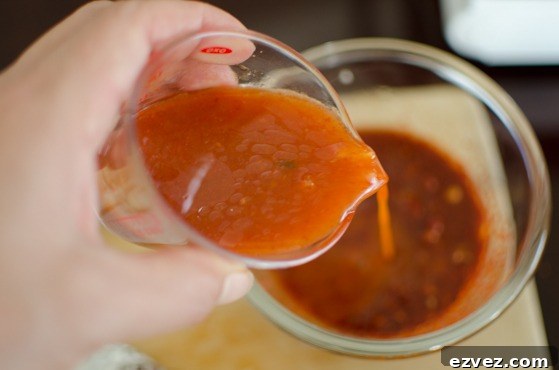 Kimchi juice is added to make a seasoning for kimchi jjigae.