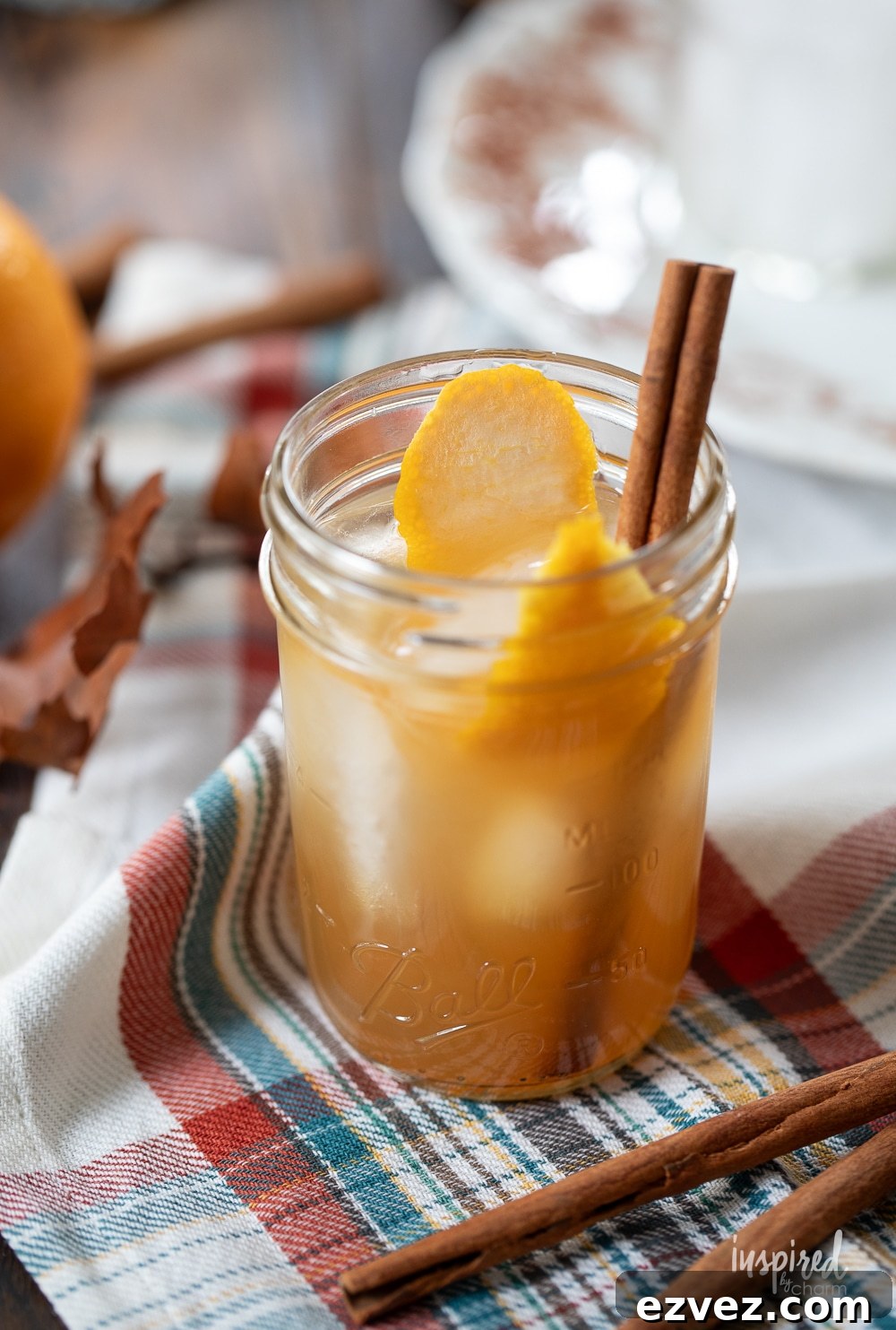 single apple cider whiskey sour in a jar. 