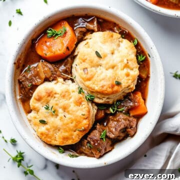Aldi Weekly Budget Meal Plan: Feb 22–28 (7-Day Menu) 6 Beef cobbler with cheddar biscuits- slow cooker beef in a bowl.