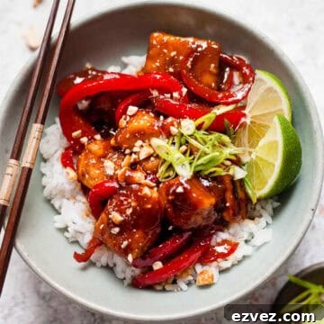 Aldi Weekly Budget Meal Plan: Feb 22–28 (7-Day Menu) 8 Sticky chicken with peppers and peanuts in a bowl with rice.