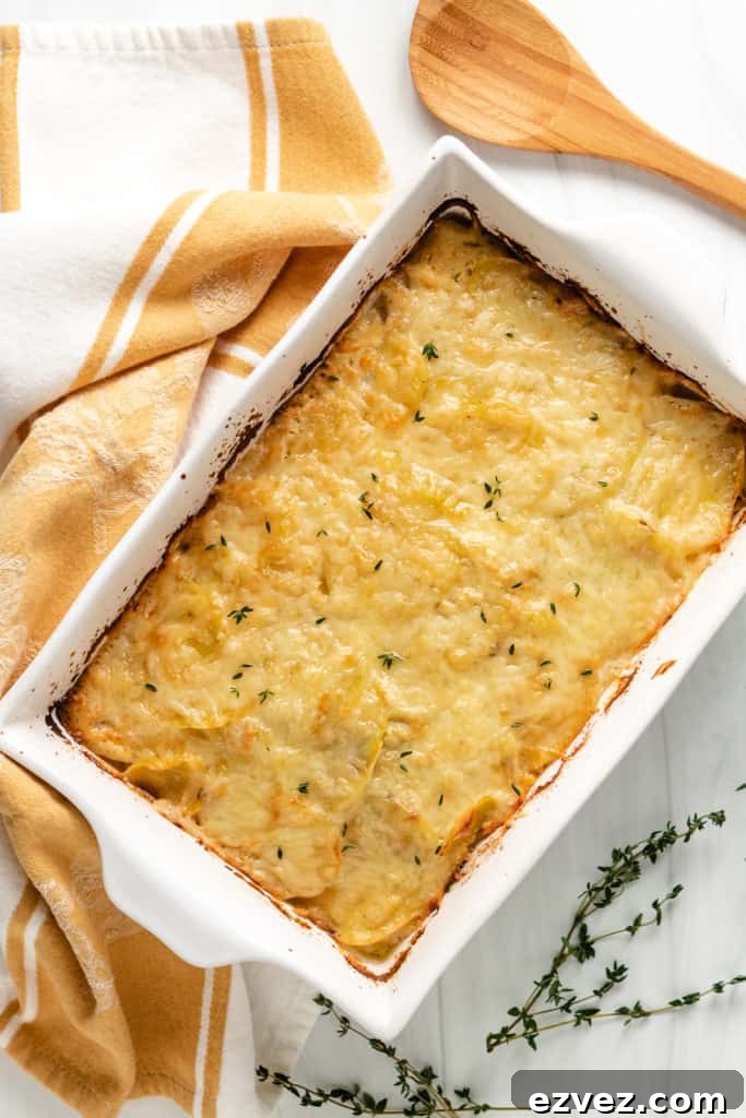 Top down view of potatoes au gratin in a baking dish.