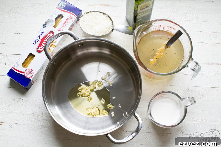 ingredients for angel hair pasta: thin pasta, heavy cream, garlic, parmesan cheese, olive oil, chicken broth, salt, and pepper. 
