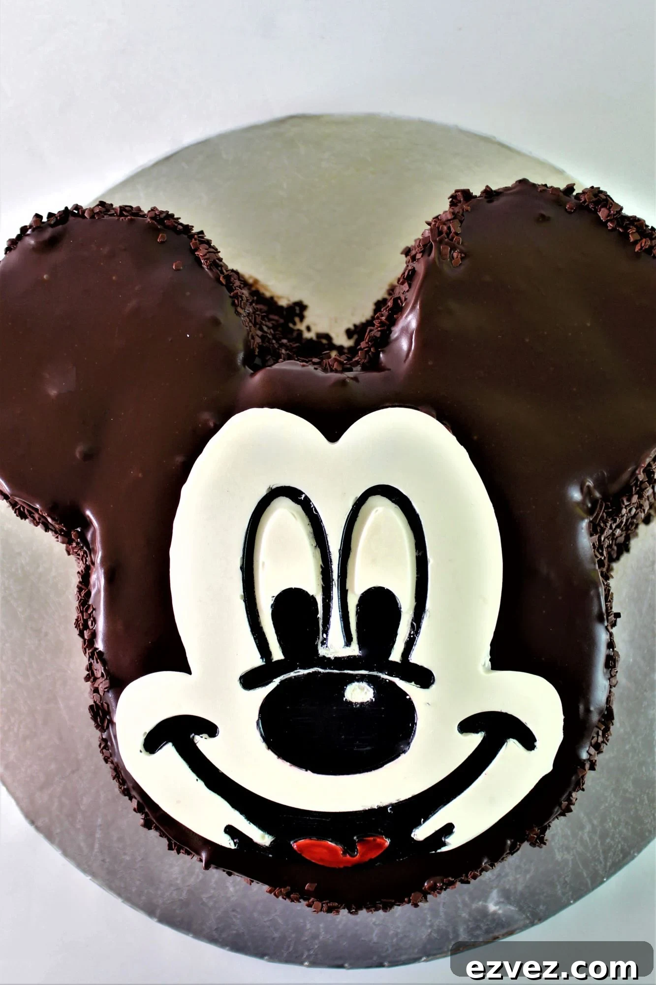 Decadent Gluten-Free Chocolate Cake Recipe for Perfect Texture 18 gluten free mickey mouse chocolate cake on round silver platter