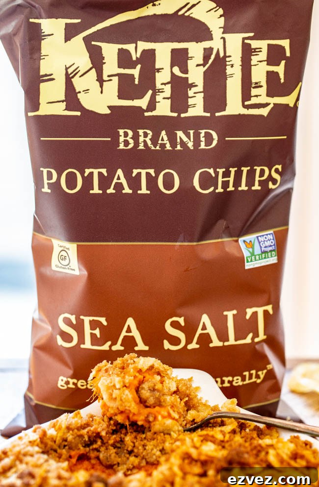 Sweet Potato Casserole With Potato Chip Topping - A fun and EASY twist on classic sweet potato casserole that uses potato chips in the topping for a SALTY-SWEET flavor the whole family will love!! Great for Thanksgiving and Christmas celebrations!!