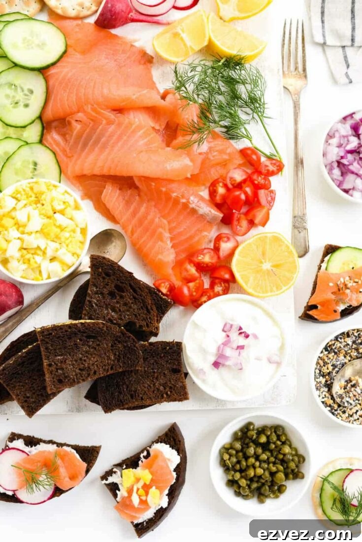 Salmon tray with other garnishes and toppings around the edges.
