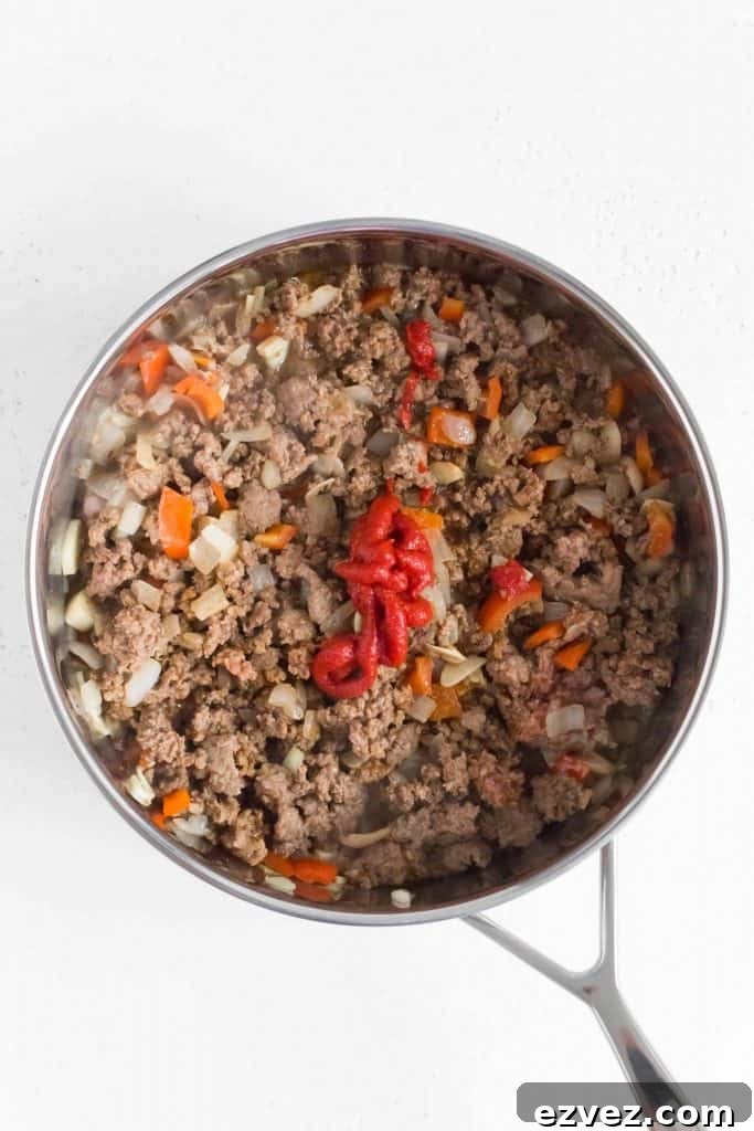 tomato paste added to the skillet