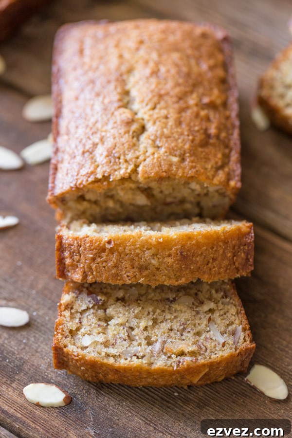 Healthier Banana Bread mini loaf that has been sliced.  