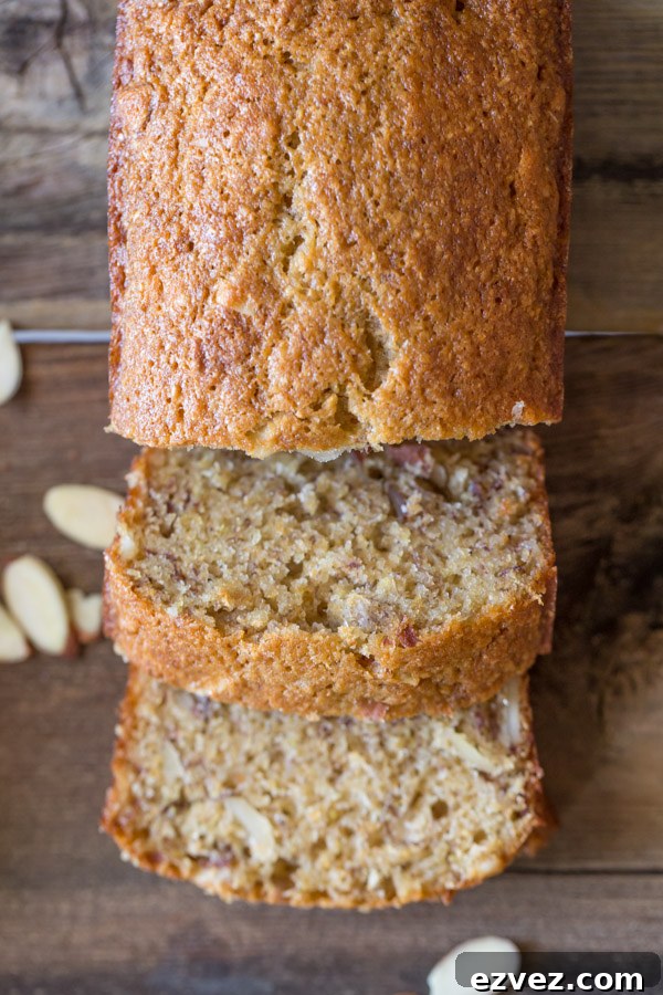 Healthier Banana Bread mini loaf that has been sliced.  