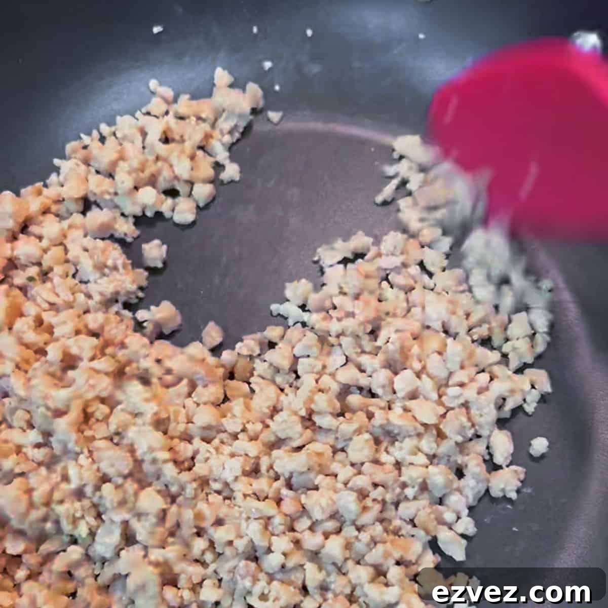 Photo of soya mince (TVP) being dry-fried in a pan.