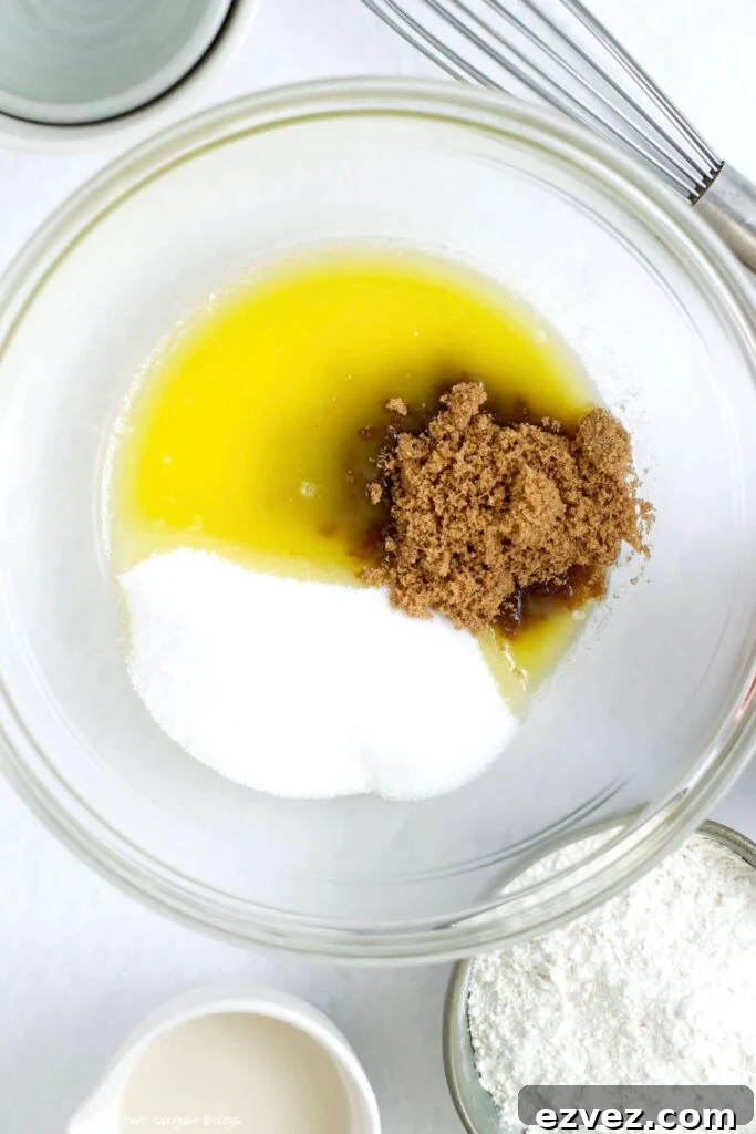 Brownie Batter Ice Cream Recipe: Rich Homemade Ice Cream with Fudge Chunks 6 melted butter, brown sugar and granulated sugar in a mixing bowl