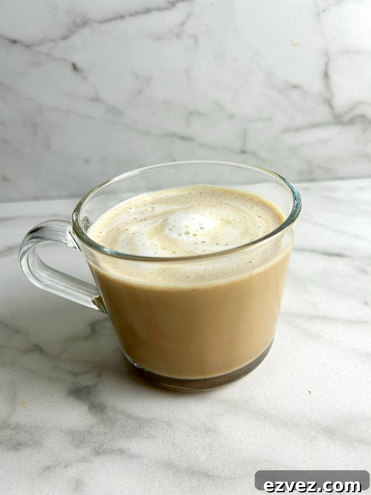 cup of french vanilla coffee with frothed milk on top