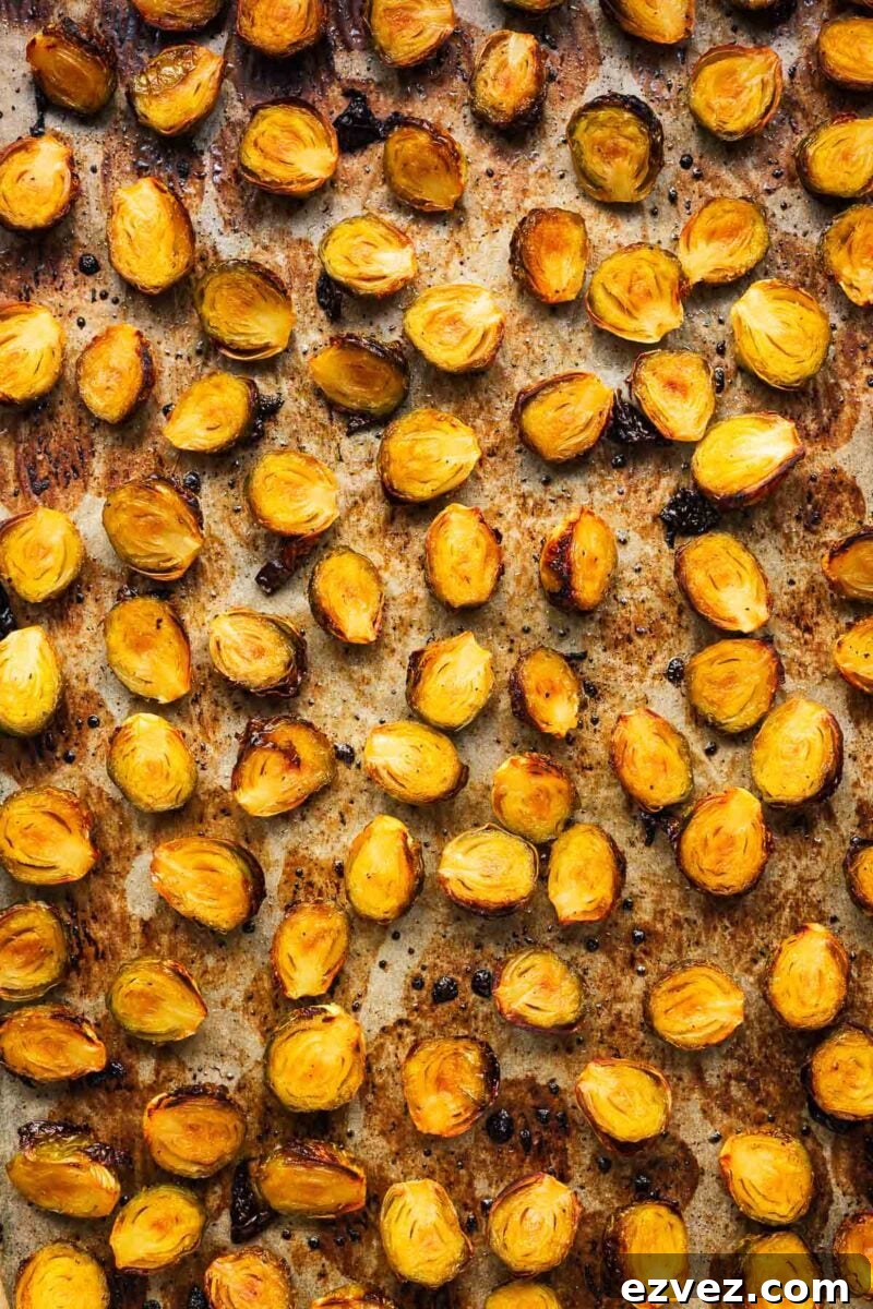 Golden roasted Brussel sprout halves viewed from above.