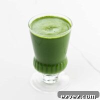 Kale Juice Benefits, Recipes, and How to Make It at Home 7 Kale juice in a glass