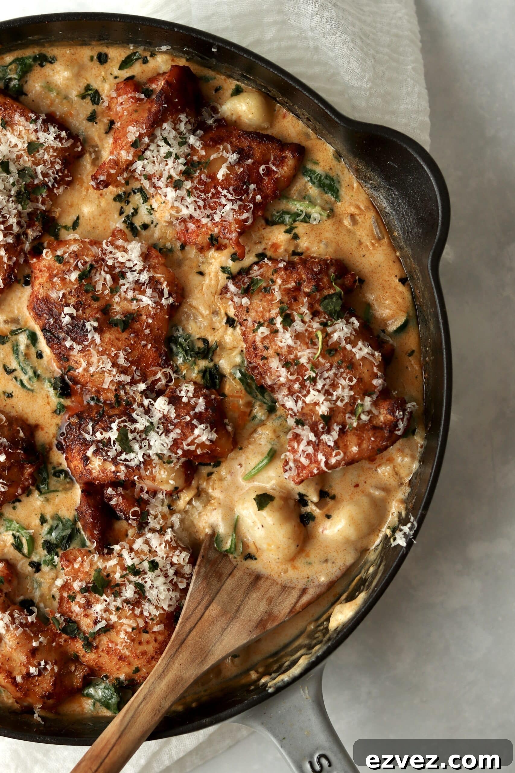 Creamy Chicken Gnocchi with Spinach and Parmesan 3 chicken and gnocchi in a creamy sauce in a skillet