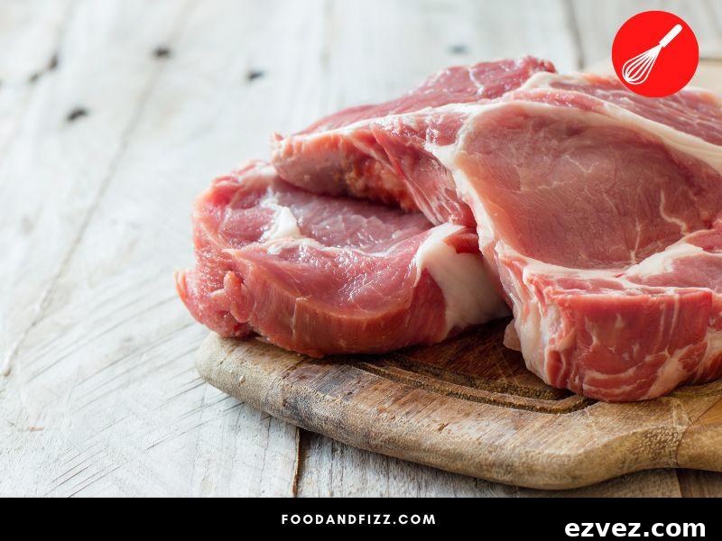 Raw pork should not have any strong smell. If it smells fishy, it has likely gone bad.