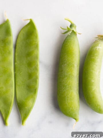 Four peas, two sugar snap and two snow peas.