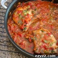 creole pork chops in a pan