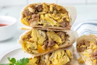 Blackstone Breakfast Burritos with Crispy Bacon & Eggs