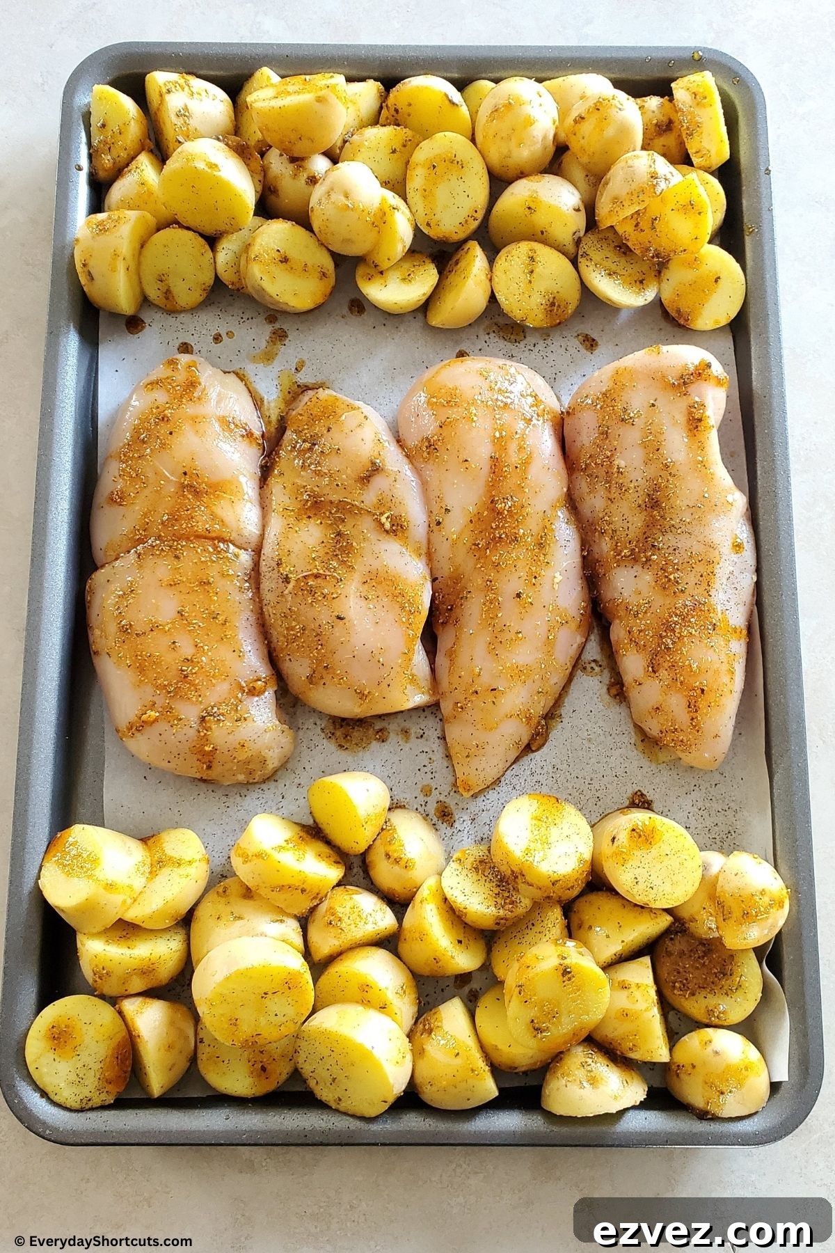Crispy Sheet Pan Chicken with Roasted Potatoes 4 seasoned chicken and baby potatoes