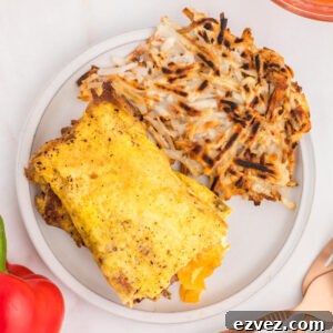 Eggs and hash browns on a plate.