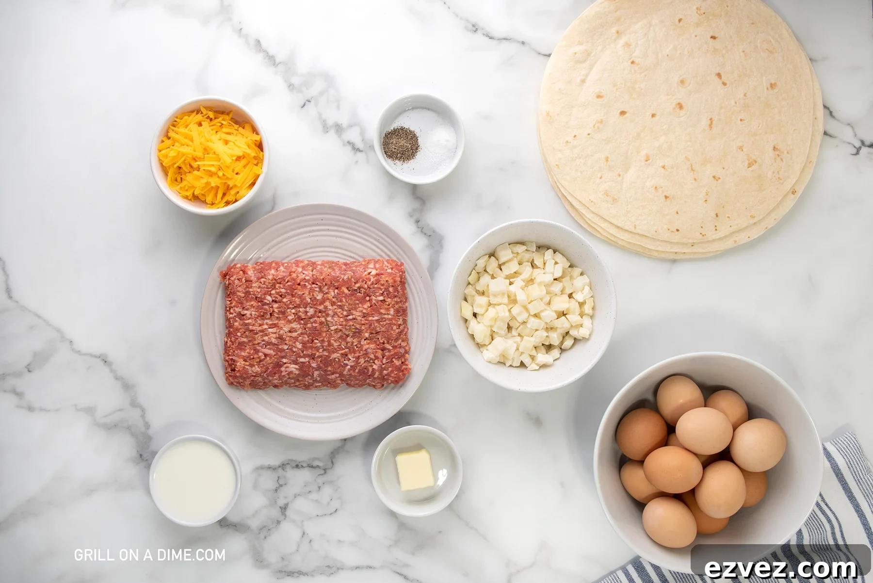 Ingredients needed - butter, sausage, eggs, salt, pepper, hash brown potatoes, milk, cheese, tortillas