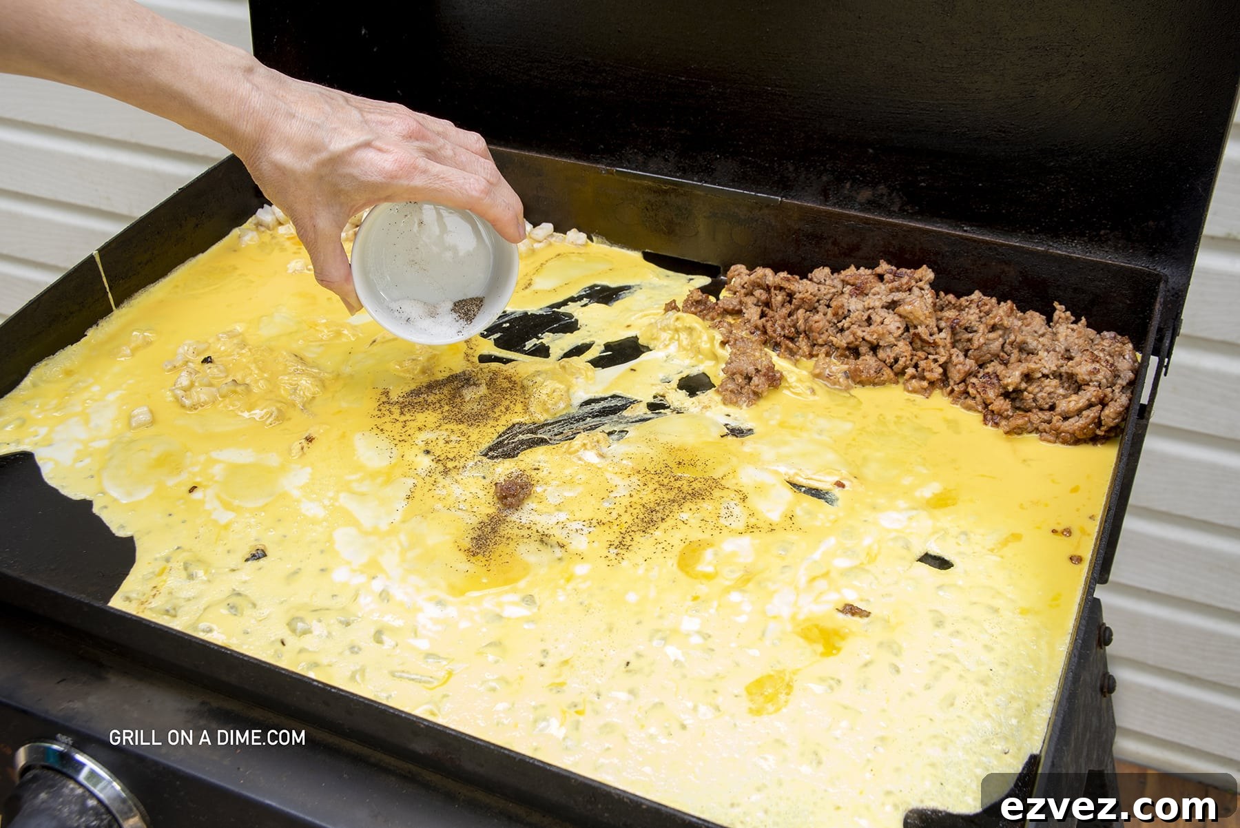 Pour egg mixture on the griddle and the cook ground sausage