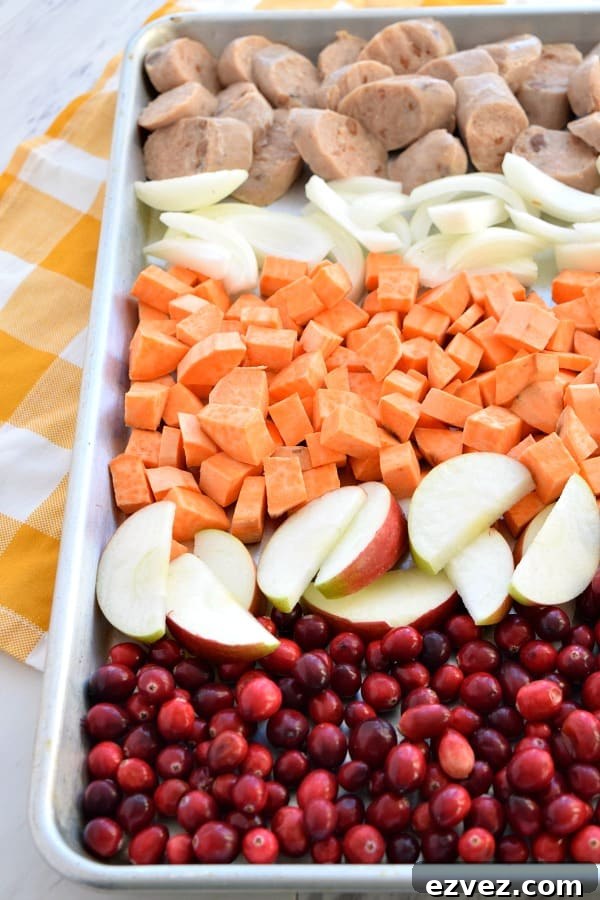 Close up of colorful uncooked Sheet Pan Cranberry Chicken Sausage