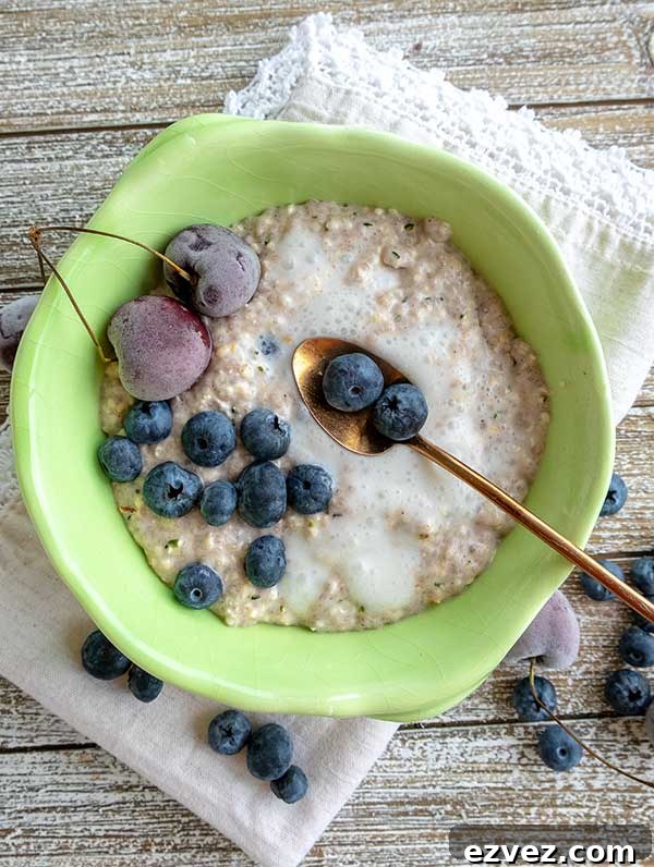 ginger bread overnight oats in a bowl with blueberries