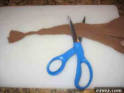 How to Dye Easter Eggs: Creative Techniques and Color Ideas 4 Tie a knot in the pantyhose and cut several inches away from the knot.